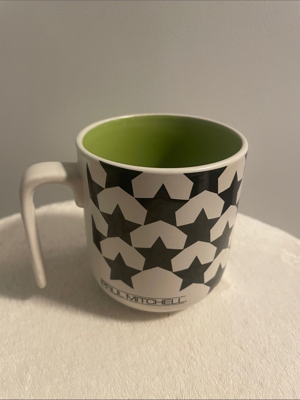 Paul Mitchell White Mug with Black Star Pattern and Green Interior